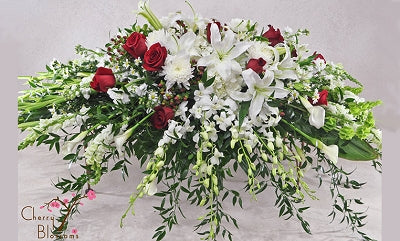 Glorious Goodby Casket Spray-Half Cover Shown