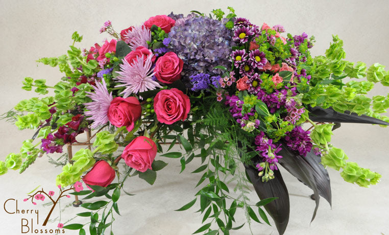 Purple and Pink Remembrance Casket Spray- Half Cover