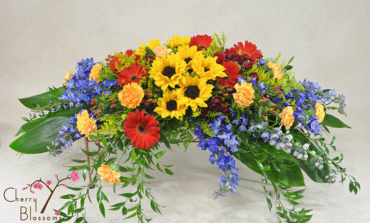 Garden Walk Casket Spray- Half Cover