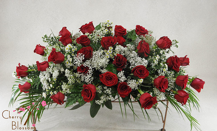 Red Rose Casket Spray-Half Cover    Also Available in Pink or White