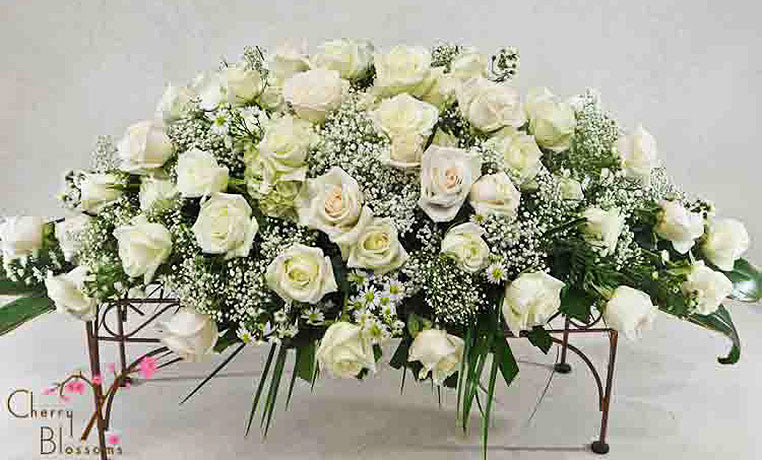 Red Rose Casket Spray-Half Cover    Also Available in Pink or White