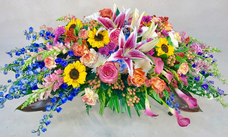 Vibrant Casket Spray- Half Cover